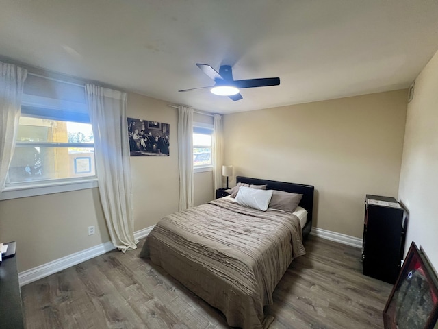 bedroom featuring ceiling fan and light wood-type flooring