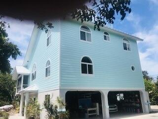 view of home's exterior with a garage