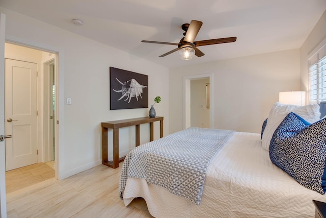 bedroom featuring light hardwood / wood-style floors and ceiling fan