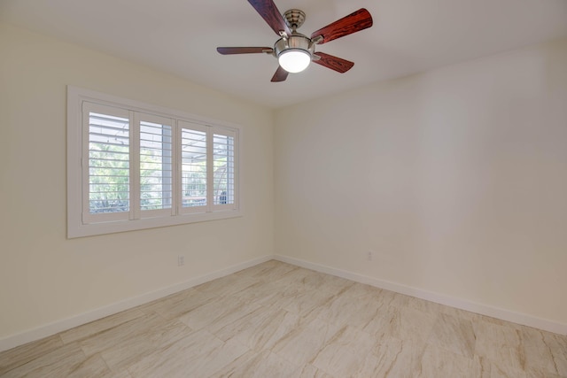 spare room featuring ceiling fan