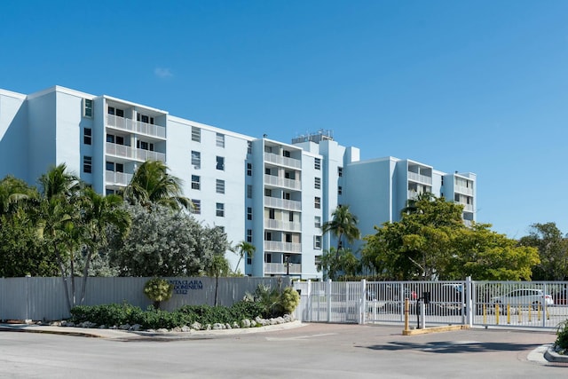 view of property with fence