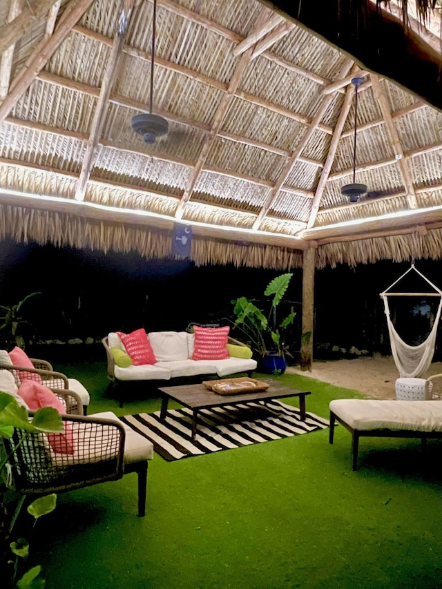 exterior space featuring a gazebo and an outdoor living space