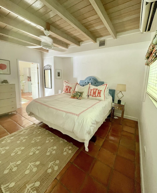 bedroom with tile patterned floors, connected bathroom, wood ceiling, beamed ceiling, and ceiling fan