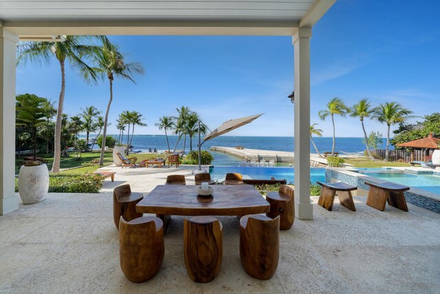 view of patio / terrace with a water view