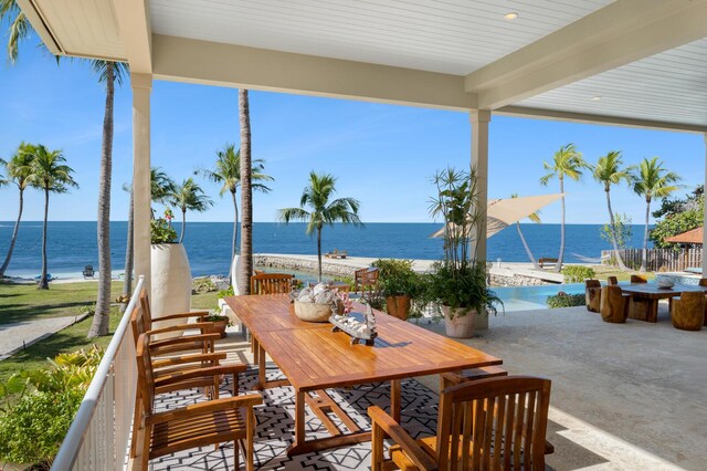 view of patio / terrace with a water view