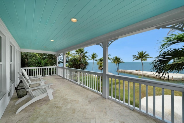 view of patio featuring a water view