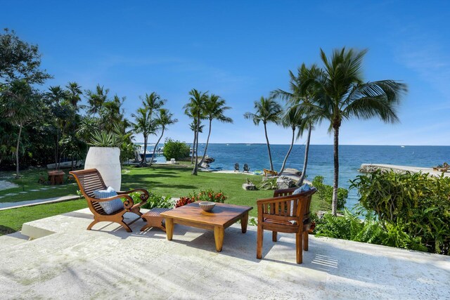 view of patio featuring a water view