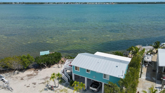 drone / aerial view with a water view