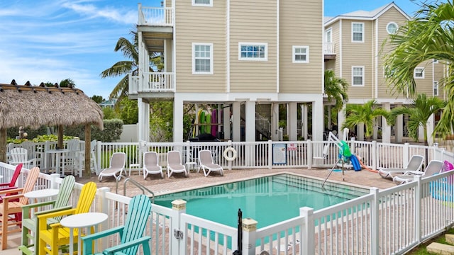 view of swimming pool featuring a gazebo and a patio