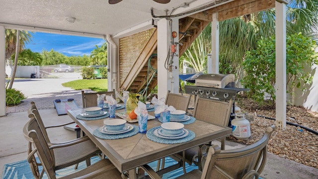 view of patio / terrace featuring ceiling fan