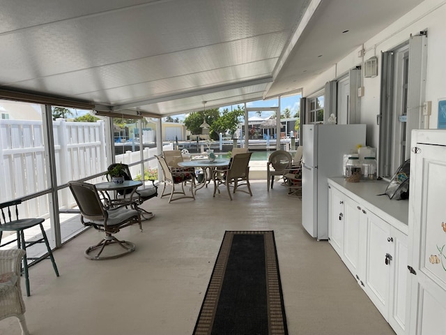 sunroom / solarium with a healthy amount of sunlight