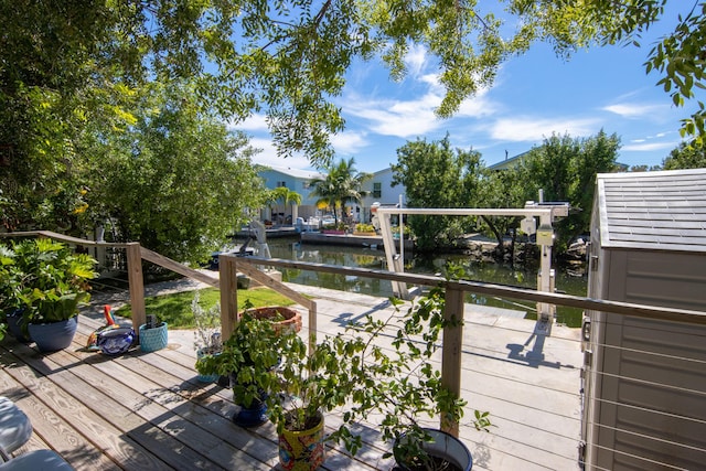 wooden deck with a water view