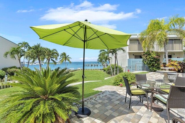 view of patio / terrace featuring a water view