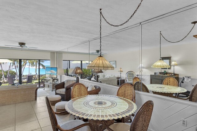 dining room featuring ceiling fan