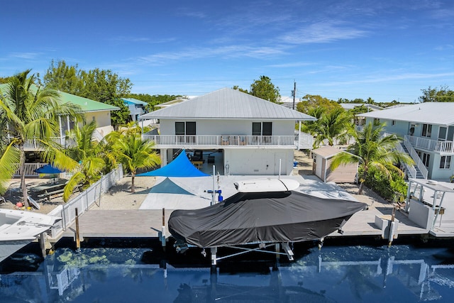 view of dock featuring boat lift and fence