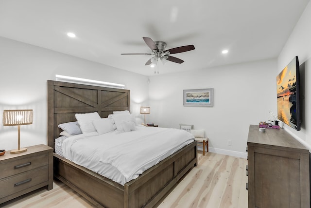 bedroom featuring a ceiling fan, light wood-style flooring, recessed lighting, and baseboards