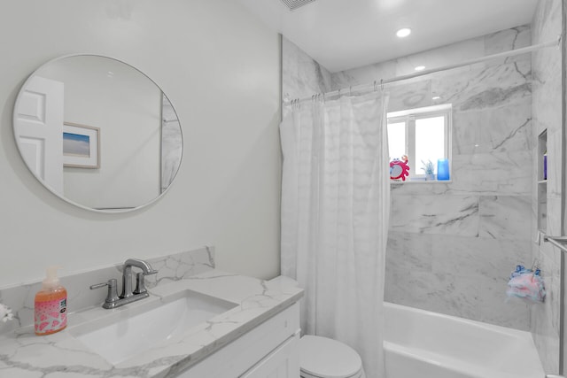 full bath featuring shower / tub combo, toilet, and vanity