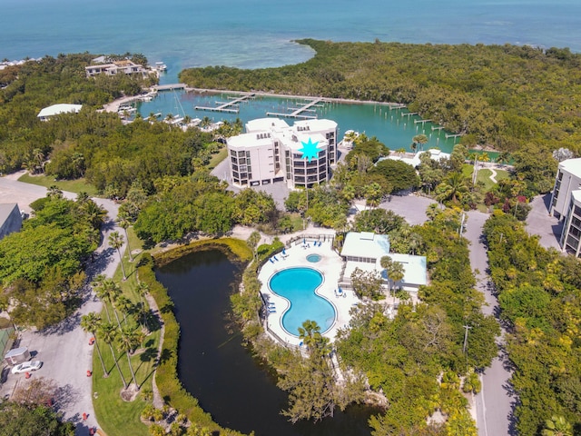 birds eye view of property featuring a water view