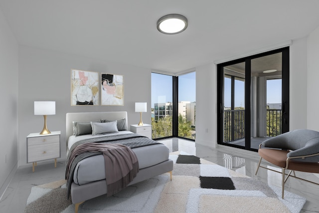 bedroom featuring floor to ceiling windows, marble finish floor, baseboards, and access to outside