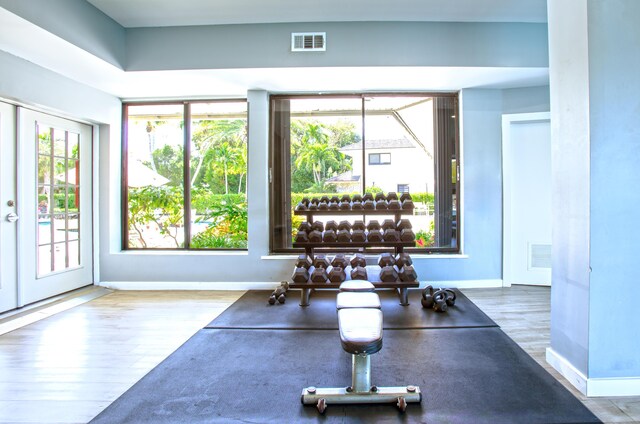 96000 Overseas Hwy Unit X54, Key Largo, FL 33037 - workout area with wood finished floors and baseboards