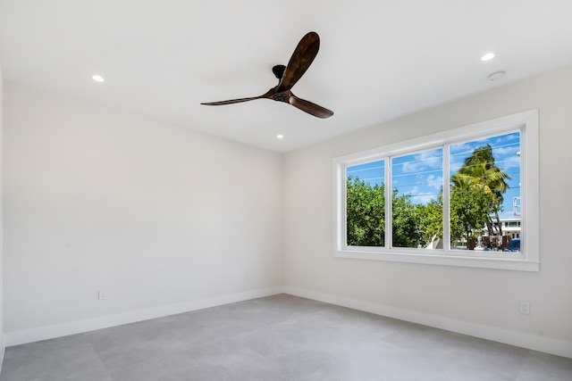 spare room with ceiling fan