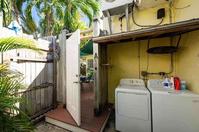 washroom with washing machine and dryer