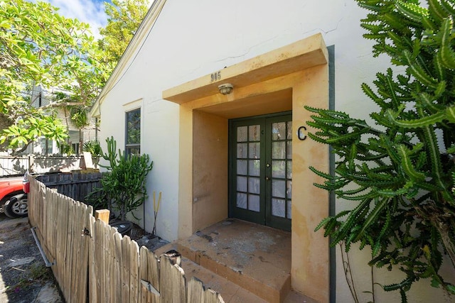 entrance to property featuring french doors