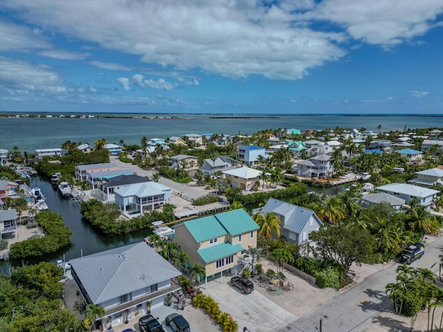 aerial view featuring a residential view and a water view