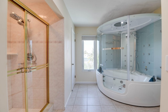 bathroom featuring tiled shower and tile patterned flooring