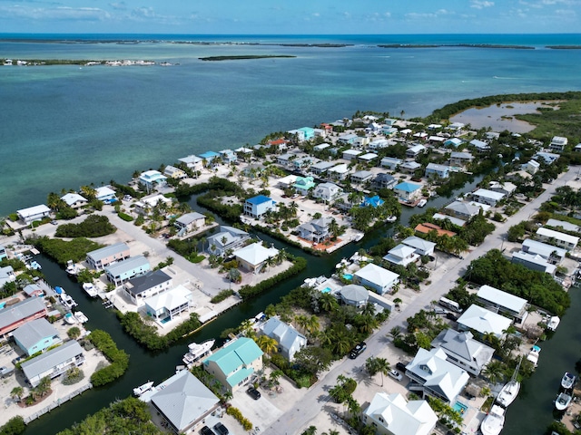 bird's eye view with a water view and a residential view