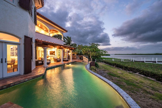 37 Cannon Royal Dr, Shark Key, FL 33040 - swimming pool with a water view and a patio