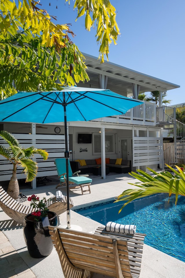 view of swimming pool with a patio and outdoor lounge area