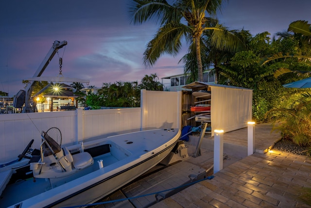 view of patio terrace at dusk