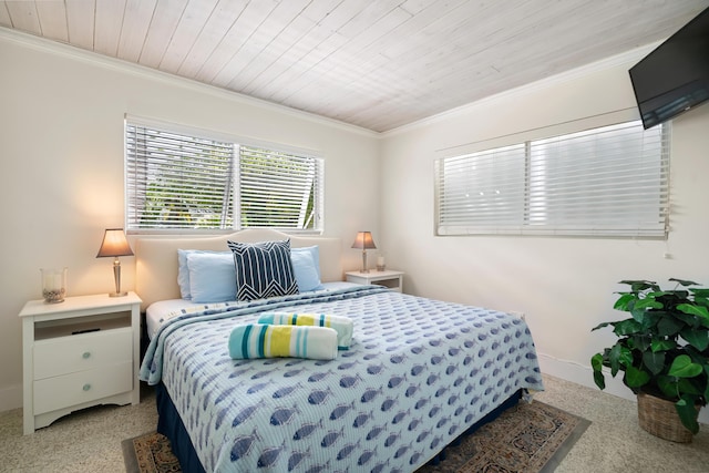 carpeted bedroom with ornamental molding and wooden ceiling