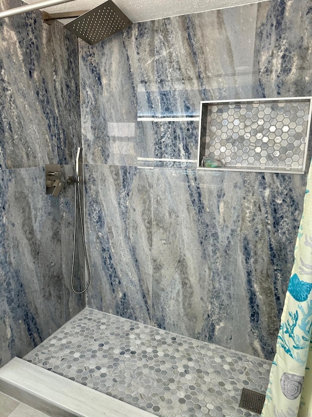 details featuring a shower with curtain