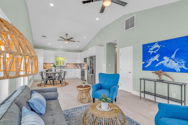 living room with recessed lighting, visible vents, ceiling fan, high vaulted ceiling, and baseboards