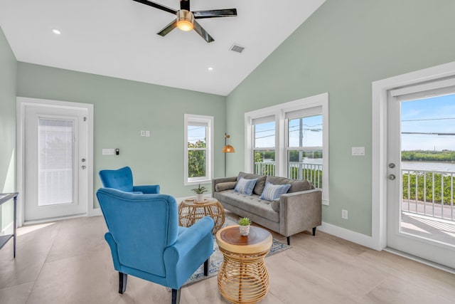 living area with ceiling fan, recessed lighting, visible vents, and baseboards