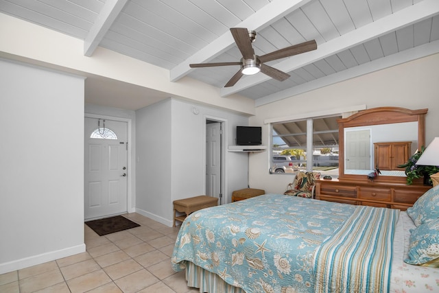 bedroom featuring vaulted ceiling with beams, light tile patterned floors, wooden ceiling, and ceiling fan