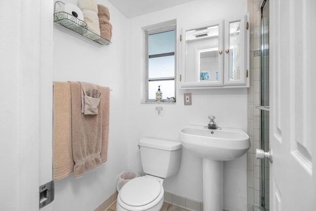 bathroom featuring sink and toilet