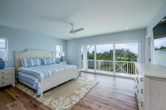 bedroom with access to exterior, wood finished floors, recessed lighting, and ceiling fan