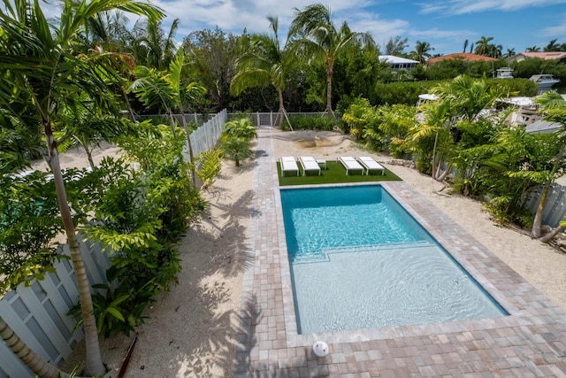 view of pool featuring a fenced in pool, fence private yard, and a patio area