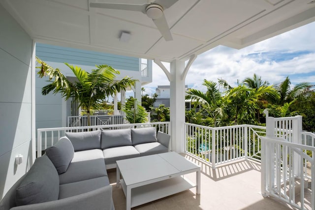 balcony with an outdoor hangout area and ceiling fan