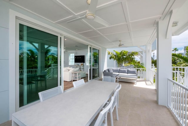 view of patio / terrace with an outdoor living space and ceiling fan