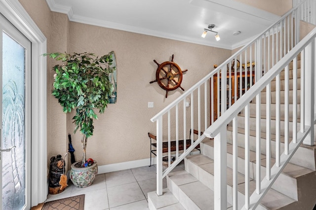 17 N Dr, Key Largo, FL 33037 - staircase with crown molding, a textured wall, baseboards, and tile patterned floors
