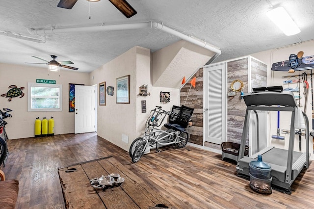17 N Dr, Key Largo, FL 33037 - exercise area featuring a ceiling fan, a textured ceiling, and wood finished floors