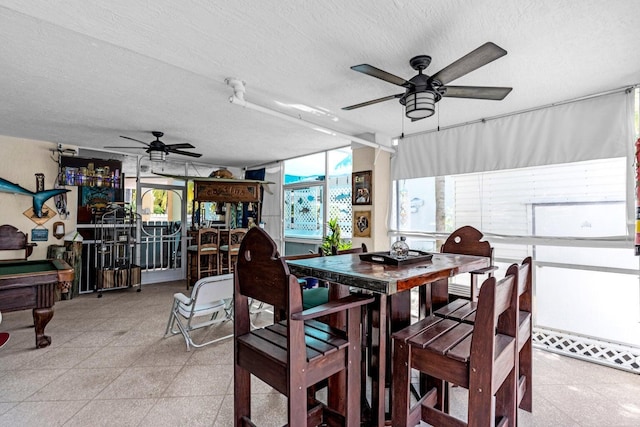 17 N Dr, Key Largo, FL 33037 - dining area featuring pool table, a ceiling fan, and a textured ceiling