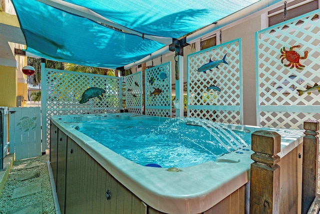 17 N Dr, Key Largo, FL 33037 - view of patio with a hot tub and fence