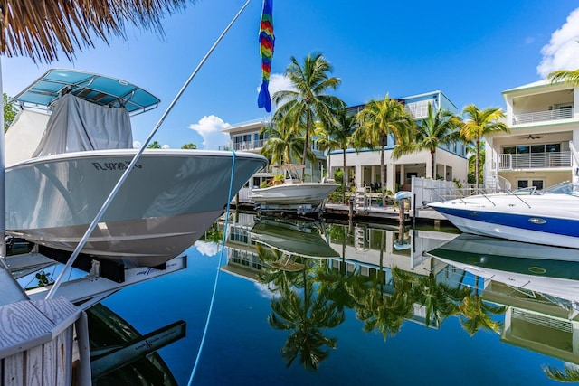17 N Dr, Key Largo, FL 33037 - dock area featuring boat lift and a water view
