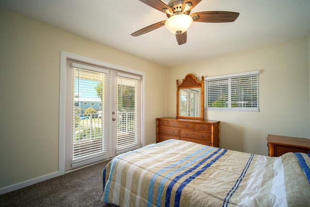 bedroom featuring dark carpet, access to outside, french doors, and ceiling fan