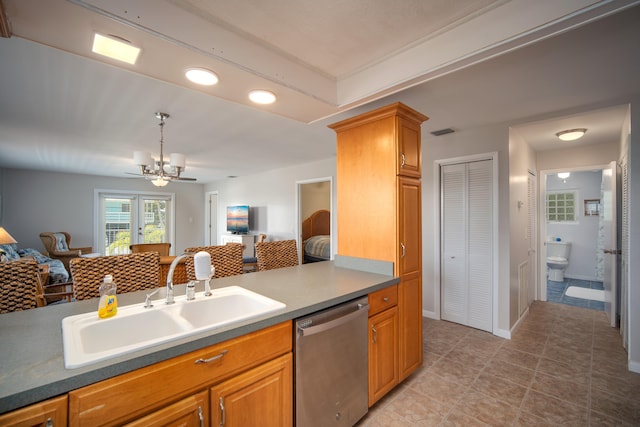 kitchen featuring decorative light fixtures, sink, stainless steel dishwasher, light tile patterned floors, and ceiling fan